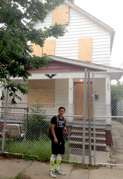 Alex Sheen portrait in front of house 