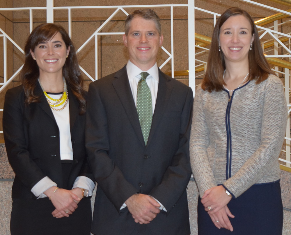 Portrait of Hogan Lovells lawyers Stacey McEvoy, Allen Hicks, and Jan Shanklin. 