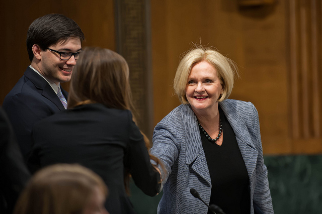 Senator Claire McCaskill shakes the hand of RAINN's Rebecca O'Connor