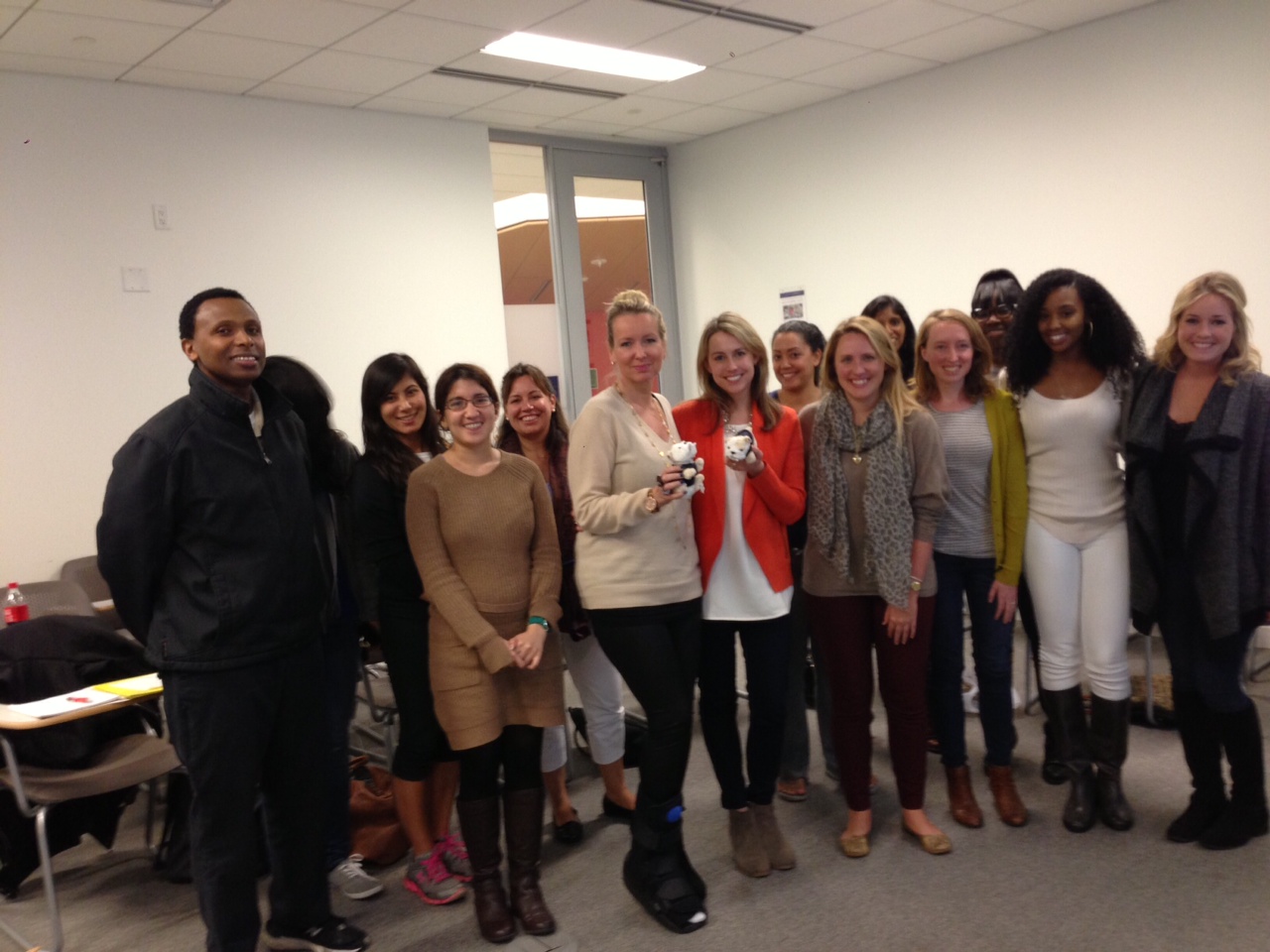 Journalism master's student pose with Katherine Hull Fliflet, RAINN's vice president of communications, and Liz Seccuro, member of RAINN's speakers bureau